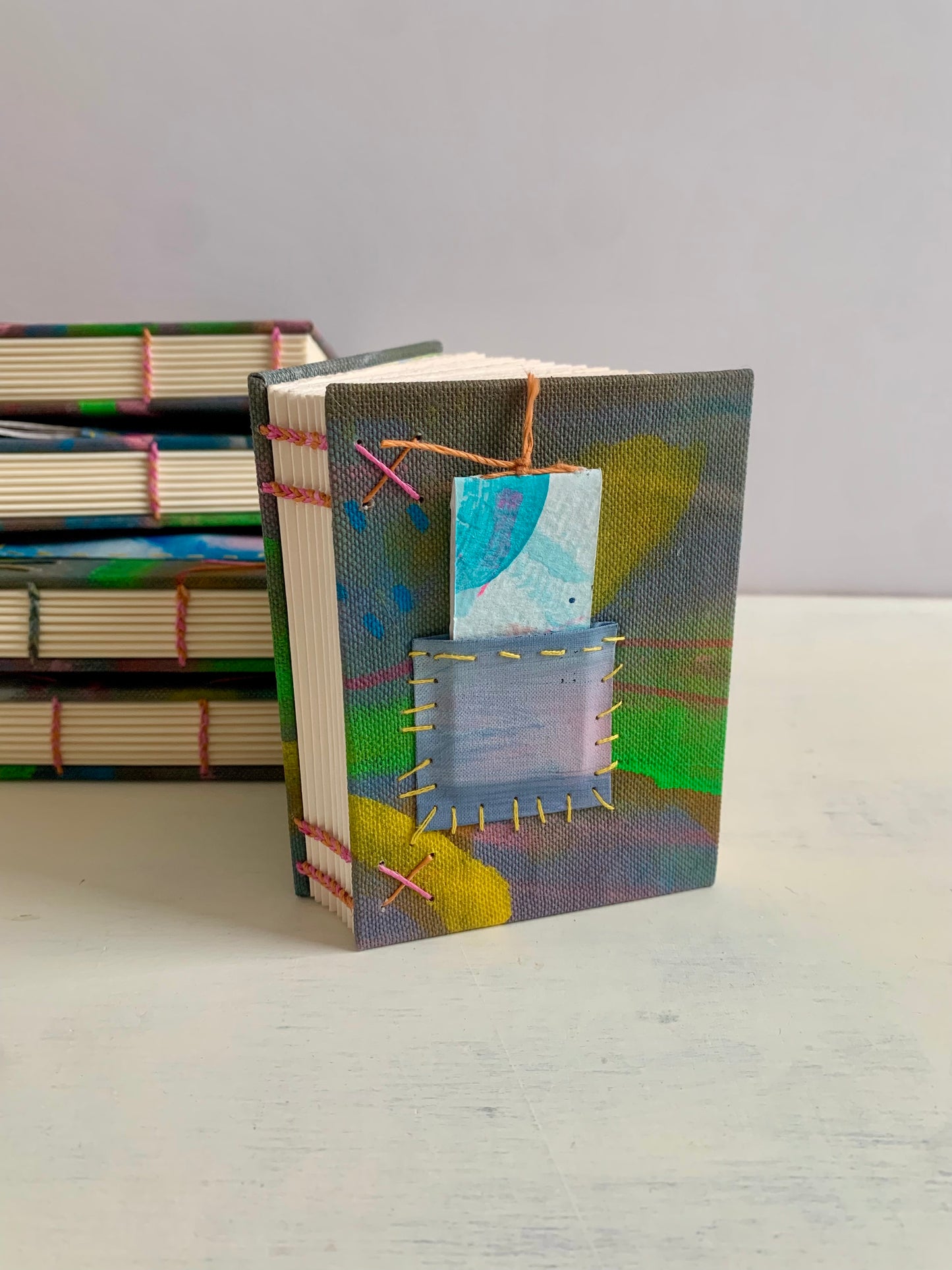 Books - Journal or sketchbook with fun hand painted covers and brightly coloured binding A7